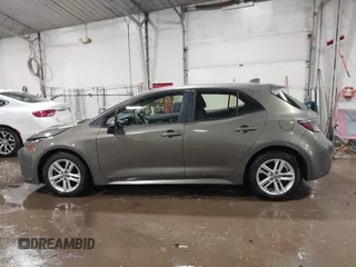 2020 Toyota Corolla SE with VIN JTND4RBE9L3095272, listed as a IAAI auction lot 41593236 with 58,304 mi miles and . Bid and sale history available at DreamBid. Image 14.