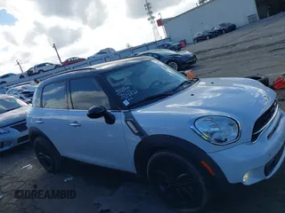2015 MINI Countryman S with VIN WMWZC3C5XFWT06360, listed as a IAAI auction lot 40774863 with 127,383 mi miles and . Bid and sale history available at DreamBid. Image 13.