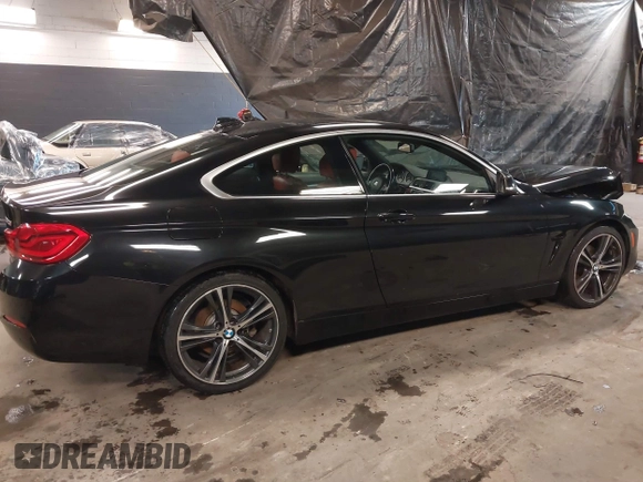2019 BMW 4 Series 430i with VIN WBA4W3C52KAF93592, listed as a IAAI auction lot 41119481 with 104,214 mi miles and . Bid and sale history available at DreamBid. Image 4.