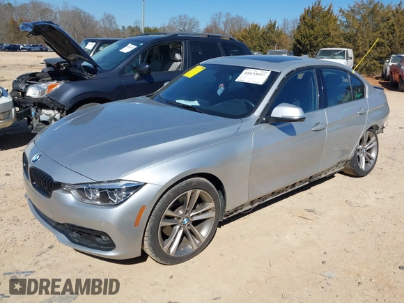 2017 BMW 3 Series 330i xDrive with VIN WBA8D9G54HNU60951, listed as a IAAI auction lot 41634617 with 76,892 mi miles. Bid and sale history available at carsss.com. Image 2.