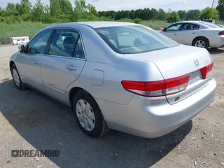 2003 Honda Accord LX with VIN 1HGCM563X3A098325, listed as a IAAI auction lot 42746146 with 204,146 mi miles and . Bid and sale history available at DreamBid. Image 3.