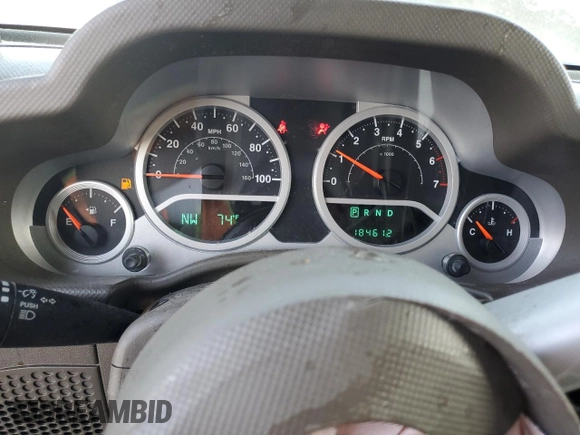 2008 Jeep Wrangler Unlimited Sahara with VIN 1J4GA59198L566019, listed as a Copart auction lot 53975965 with 184,612 mi miles and Salvage Title. Bid and sale history available at carsss.com. Image 9.