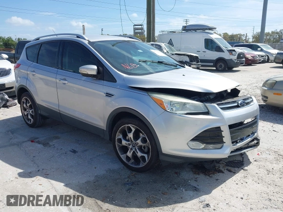 2014 Ford Escape Titanium с VIN 1FMCU0J9XEUB93591, выставлен на аукционе IAAI как лот 41721869 с пробегом 98 859 миль миль и . История ставок и продаж доступна на DreamBid. Изображение 1.
