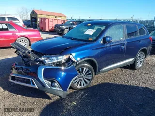 2019 Mitsubishi Outlander ES with VIN JA4AZ3A35KZ004719, listed as a IAAI auction lot 41637009 with 66,263 mi miles. Bid and sale history available at carsss.com. Image 2.