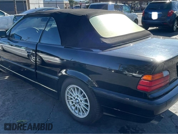 1997 BMW 3-Series 328IC with VIN WBABK8324VET98240, listed as a Copart auction lot 52457785 with 1 mi miles and Clean Title. Bid and sale history available at carsss.com. Image 3.
