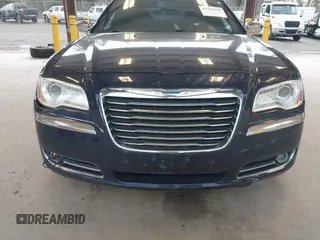2013 Chrysler 300 with VIN 2C3CCAET7DH673242, listed as a IAAI auction lot 41785948 with 135,968 mi miles. Bid and sale history available at carsss.com. Image 6.