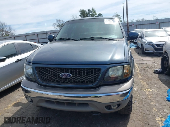 2003 Ford F-150 XLT with VIN 1FTRW08L33KB05743, listed as a IAAI auction lot 41828979 with 117,345 mi miles. Bid and sale history available at carsss.com. Image 12.
