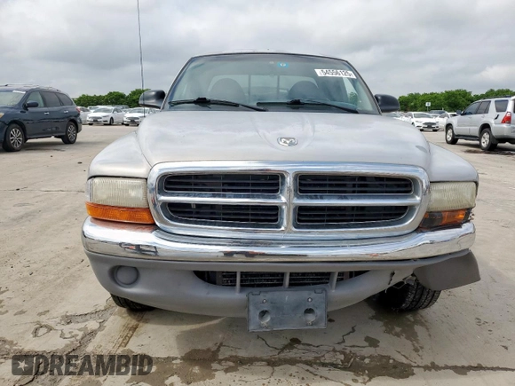 1998 Dodge Dakota SLT z VIN 1B7GL22X8WS651451, wystawiony jako Copart lot #54556125 z przebiegiem 164 186 mil mil oraz Szkoda całkowita • Salvage title. Historia ofert i sprzedaży dostępna na DreamBid. Obrazek 5.