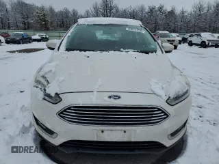 2016 Ford Focus Titanium с VIN 1FADP3N21GL312173, выставлен на аукционе Copart как лот 45011755 с пробегом 87 099 миль миль и На запчасти • Non repairable. История ставок и продаж доступна на DreamBid. Изображение 5.
