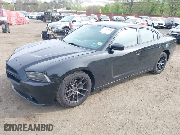 2012 Dodge Charger SE with VIN 2C3CDXBG1CH218814, listed as a IAAI auction lot 42125550 with 113,784 mi miles. Bid and sale history available at carsss.com. Image 2.