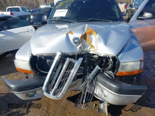 2004 Dodge Dakota Sport with VIN 1D7HG38K44S591424, listed as a IAAI auction lot 41645873 with 135,396 mi miles. Bid and sale history available at carsss.com. Image 6.