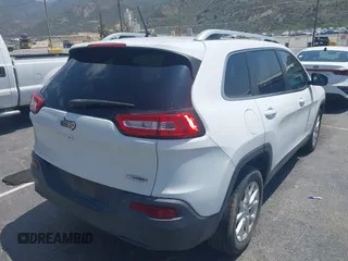 2015 Jeep Cherokee Latitude with VIN 1C4PJLCB7FW790865, listed as a IAAI auction lot 42182034 with 161,642 mi miles and . Bid and sale history available at carsss.com. Image 4.