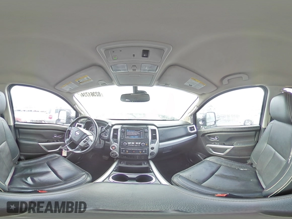 2018 Nissan Titan Pro-4X z VIN 1N6AA1E51JN536680, wystawiony jako Copart lot #82361724 z przebiegiem 98 699 mil mil oraz Szkoda całkowita • Salvage title. Historia ofert i sprzedaży dostępna na DreamBid. Obrazek 14.