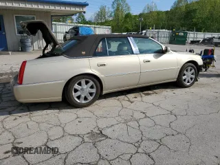 2007 Cadillac DTS Luxury I z VIN 1G6KD57Y57U120596, wystawiony jako Copart lot #55058175 z przebiegiem 119 593 mil mil oraz Szkoda całkowita • Salvage title. Historia ofert i sprzedaży dostępna na DreamBid. Obrazek 3.