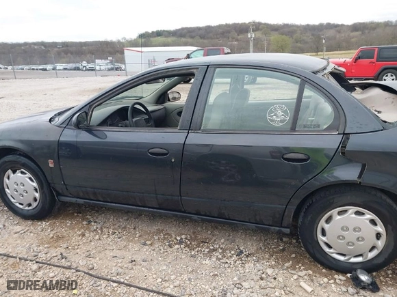 2002 Saturn SL with VIN 1G8ZH52852Z270057, listed as a IAAI auction lot 41816011 with 314,884 mi miles. Bid and sale history available at carsss.com. Image 14.