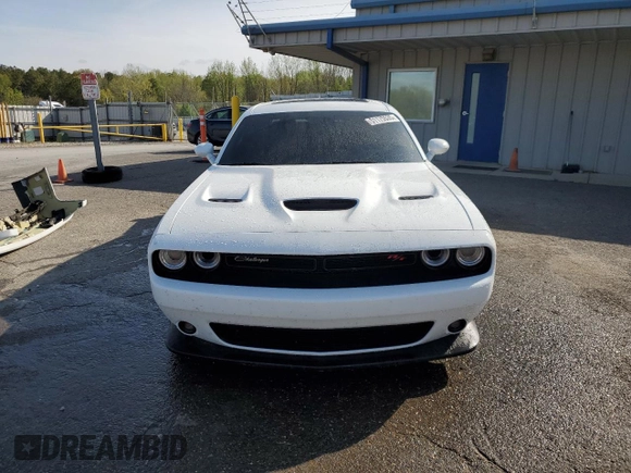 2021 Dodge Challenger R/T Scat Pack Widebody z VIN 2C3CDZFJ4MH649649, wystawiony jako Copart lot #51175535 z przebiegiem 52 535 mil mil oraz Szkoda całkowita • Salvage title. Historia ofert i sprzedaży dostępna na DreamBid. Obrazek 5.