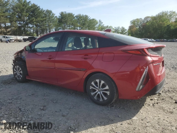 2021 Toyota Prius LE z VIN JTDKAMFP2M3182323, wystawiony jako Copart lot #54396715 z przebiegiem 68 525 mil mil oraz Szkoda całkowita • Salvage title. Historia ofert i sprzedaży dostępna na DreamBid. Obrazek 2.