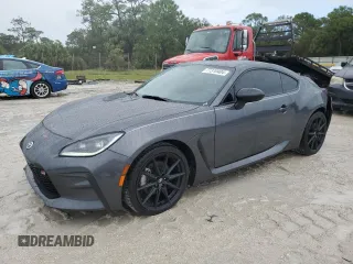 2022 Toyota GR86 Premium with VIN JF1ZNBE13N9757764, listed as a Copart auction lot 77310404 with 12,589 mi miles and Salvage Title. Bid and sale history available at carsss.com. Image 1.