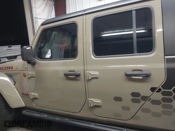 2020 Jeep Gladiator Rubicon z VIN 1C6JJTBGXLL178893, wystawiony jako IAAI lot #42206863 z przebiegiem 29 138 mil mil oraz . Historia ofert i sprzedaży dostępna na DreamBid. Obrazek 15.