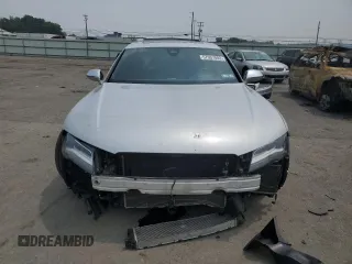 2015 Audi RS 7 с VIN WAUW2CFC5FN013049, выставлен на аукционе Copart как лот 57957093 с пробегом 95 826 миль миль и . История ставок и продаж доступна на DreamBid. Изображение 5.