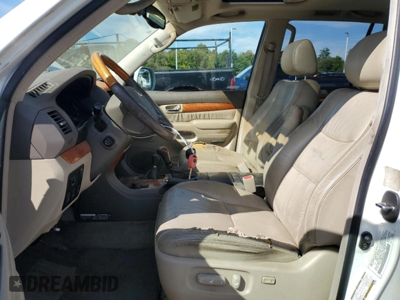 2004 Lexus GX 470 with VIN JTJBT20XX40033938, listed as a Copart auction lot 70871164 with 214,565 mi miles and Salvage Title. Bid and sale history available at carsss.com. Image 7.