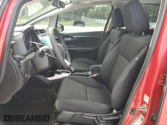2015 Honda Fit EX-L z VIN 3HGGK5H88FM738491, wystawiony jako Copart lot #56782435 z przebiegiem 94 727 mil mil oraz Szkoda całkowita • Salvage title. Historia ofert i sprzedaży dostępna na DreamBid. Obrazek 7.