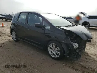 2010 Honda Fit Sport with VIN JHMGE8H44AS021590, listed as a Copart auction lot 52333635 with 137,770 mi miles and Salvage title. Bid and sale history available at DreamBid. Image 4.