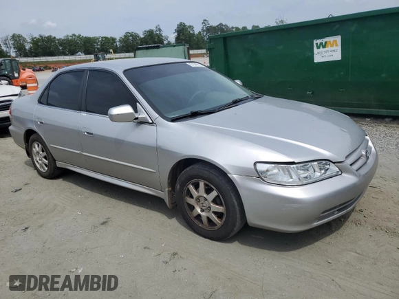 2001 Honda Accord LX z VIN 1HGCG564X1A135855, wystawiony jako Copart lot #57346815 z przebiegiem 235 585 mil mil oraz Szkoda całkowita • Salvage title. Historia ofert i sprzedaży dostępna na DreamBid. Obrazek 4.