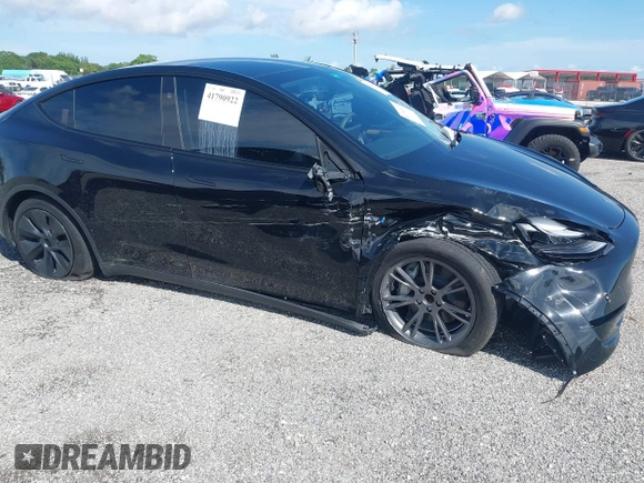 2024 Tesla Model Y z VIN 7SAYGDED6RF191135, wystawiony jako IAAI lot #41790922 z przebiegiem 17 154 mil mil oraz . Historia ofert i sprzedaży dostępna na DreamBid. Obrazek 6.