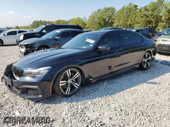2019 BMW 7 Series 740i with VIN WBA7E2C50KB216499, listed as a Copart auction lot 68828673 with 94,549 mi miles. Bid and sale history available at carsss.com. Image 1.