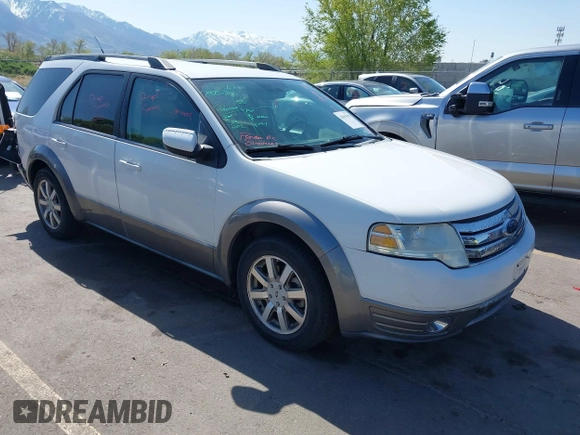 2008 Ford Taurus X SEL with VIN 1FMDK05W98GA41945, listed as a IAAI auction lot 42067959 with 157,896 mi miles and . Bid and sale history available at DreamBid. Image 1.