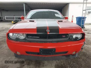 2009 Dodge Challenger R/T z VIN 2B3LJ54TX9H558332, wystawiony jako IAAI lot #42118072 z przebiegiem 173 010 mil mil oraz . Historia ofert i sprzedaży dostępna na DreamBid. Obrazek 13.