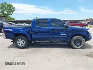 2014 Toyota Tacoma with VIN 3TMLU4EN6EM148851, listed as a IAAI auction lot 42307954 with 71,784 mi miles and . Bid and sale history available at DreamBid. Image 14.