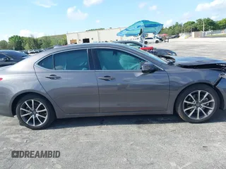 2019 Acura TLX z VIN 19UUB2F38KA002232, wystawiony jako IAAI lot #42271717 z przebiegiem 27 945 mil mil oraz . Historia ofert i sprzedaży dostępna na DreamBid. Obrazek 13.