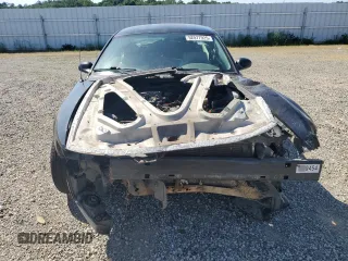 2004 Ford Mustang GT Deluxe z VIN 1FAFP42X64F137315, wystawiony jako Copart lot #52577925 z przebiegiem 210 557 mil mil oraz Szkoda całkowita • Salvage title. Historia ofert i sprzedaży dostępna na DreamBid. Obrazek 5.