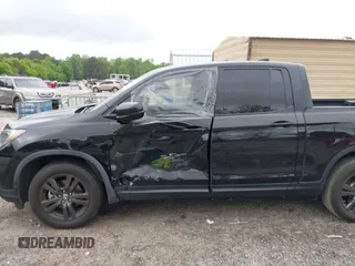 2019 Honda Ridgeline Sport with VIN 5FPYK2F10KB008474, listed as a IAAI auction lot 42144225 with 101,274 mi miles and . Bid and sale history available at DreamBid. Image 6.