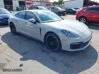 2021 Porsche Panamera with VIN WP0AJ2A79ML117881, listed as a IAAI auction lot 41662356 with 34,584 mi miles. Bid and sale history available at carsss.com. Image 1.