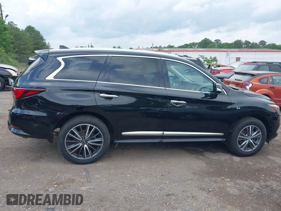 2020 Infiniti QX60 LUXE with VIN 5N1DL0MM8LC516594, listed as a IAAI auction lot 42136299 with 92,747 mi miles. Bid and sale history available at carsss.com. Image 13.