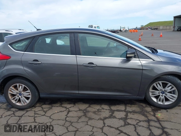 2012 Ford Focus SEL with VIN 1FAHP3M29CL314685, listed as a IAAI auction lot 41974881 with 167,119 mi miles. Bid and sale history available at carsss.com. Image 13.