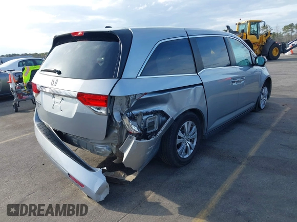 2017 Honda Odyssey EX-L with VIN 5FNRL5H64HB017661, listed as a IAAI auction lot 41719447 with 99,895 mi miles and . Bid and sale history available at DreamBid. Image 4.