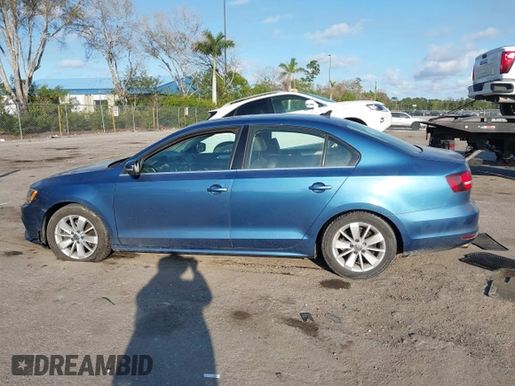 2016 Volkswagen Jetta Sedan 1.4T SE with VIN 3VWD67AJ0GM328412, listed as a IAAI auction lot 41556254 with 137,814 mi miles. Bid and sale history available at carsss.com. Image 14.