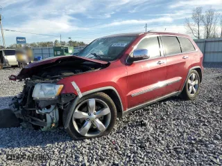 2012 Jeep Grand Cherokee Overland with VIN 1C4RJFCG1CC113295, listed as a Copart auction lot 49785785 with 0 mi miles and Salvage Title. Bid and sale history available at carsss.com. Image 1.