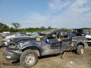 2001 Ford F-150 SuperCrew XLT with VIN 1FTRW08L41KE26431, listed as a Copart auction lot 70040784 with 0 mi miles and Salvage Title. Bid and sale history available at carsss.com. Image 1.