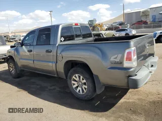 2008 Mitsubishi Raider LS z VIN 1Z7HT28KX8S620516, wystawiony jako Copart lot #76298034 z przebiegiem 185 938 mil mil oraz Szkoda całkowita • Salvage title. Historia ofert i sprzedaży dostępna na DreamBid. Obrazek 2.