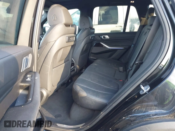 2021 BMW X5 xDrive40i with VIN 5UXCR6C08M9D76272, listed as a IAAI auction lot 41219782 with 56,599 mi miles and . Bid and sale history available at DreamBid. Image 8.
