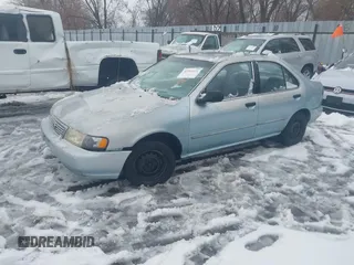 1997 Nissan Sentra XE with VIN 1N4AB41D5VC710773, listed as a IAAI auction lot 41561411 with 217,561 mi miles and . Bid and sale history available at DreamBid. Image 2.