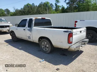 1999 Nissan Frontier XE with VIN 1N6DD26S3XC326231, listed as a Copart auction lot 51710615 with 228,174 mi miles and Salvage title. Bid and sale history available at DreamBid. Image 2.