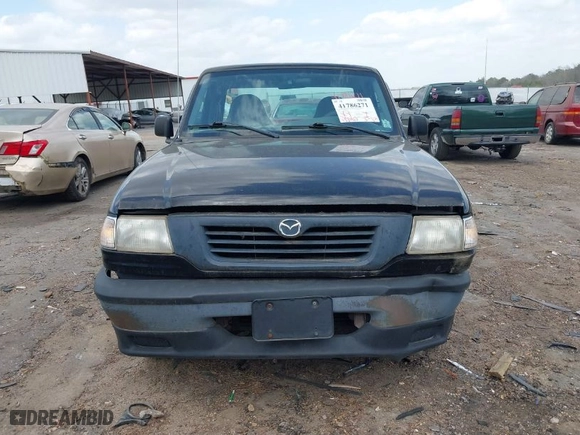 1999 Mazda B-Series 2WD Truck SX with VIN 4F4YR12C0XTM33825, listed as a IAAI auction lot 41786271 with 137,913 mi miles. Bid and sale history available at carsss.com. Image 6.