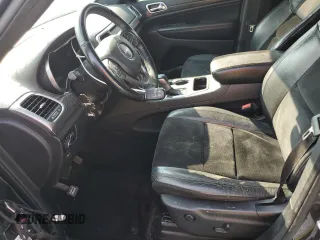 2018 Jeep Grand Cherokee Altitude with VIN 1C4RJEAG4JC145023, listed as a Copart auction lot 59001735 with 127,627 mi miles and Salvage title. Bid and sale history available at DreamBid. Image 7.