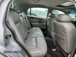 1998 Lincoln Town Car Cartier z VIN 1LNFM83W6WY649580, wystawiony jako Copart lot #59198865 z przebiegiem 253 735 mil mil oraz Czysty tytuł • Clean title. Historia ofert i sprzedaży dostępna na DreamBid. Obrazek 10.
